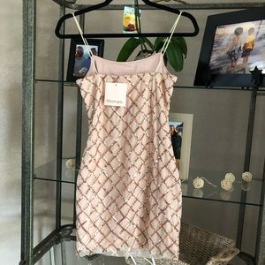 rhythm of love dress in rose gold